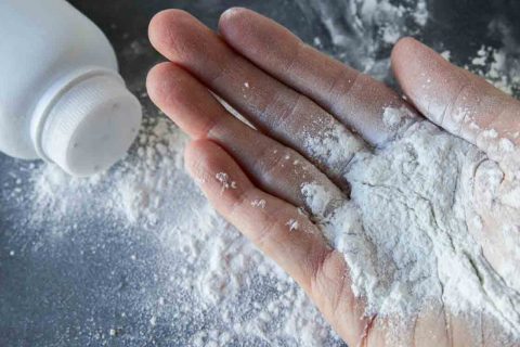 Talcum powder on hands