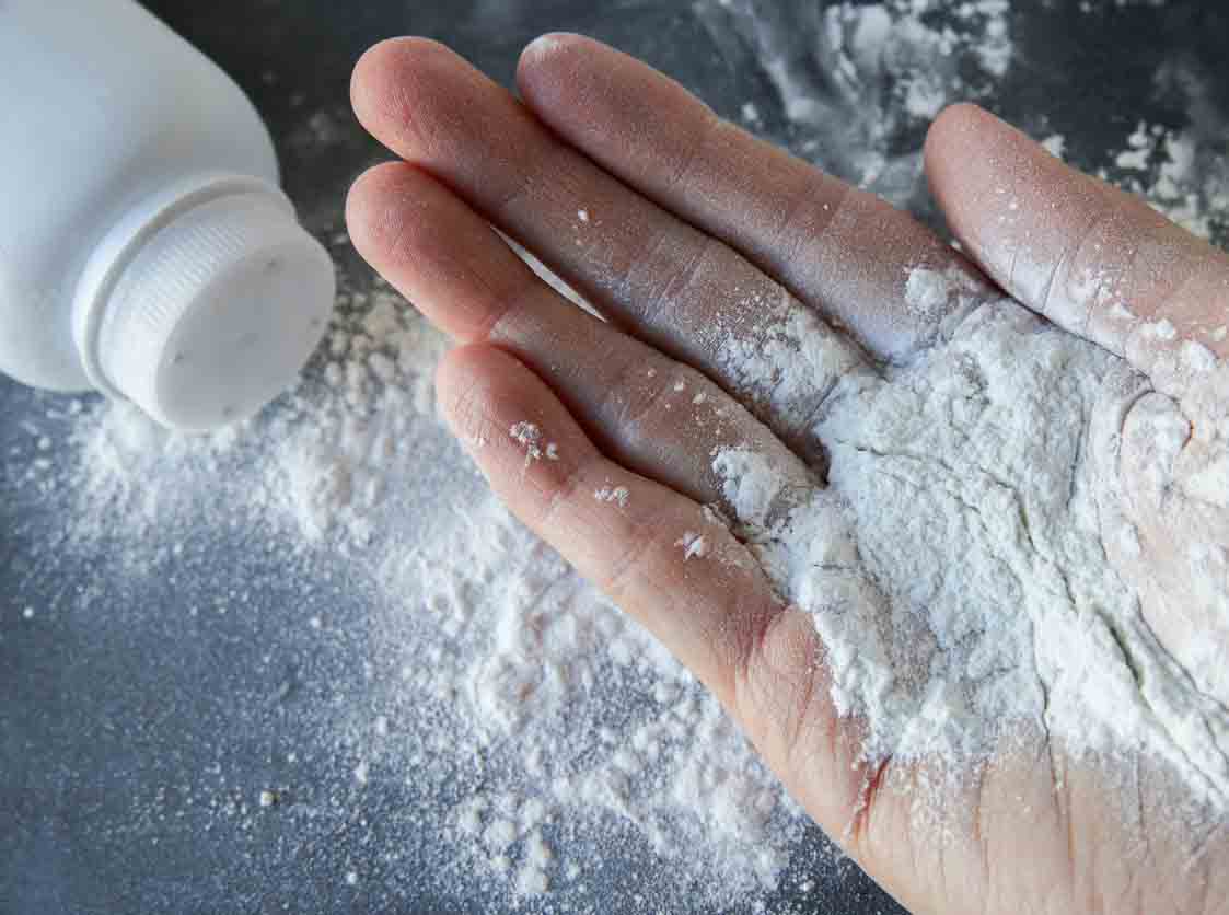 Talcum powder on hands