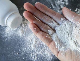 Talcum powder on hands