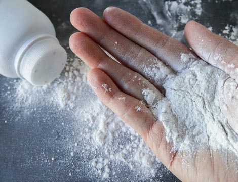 Talcum powder on hands