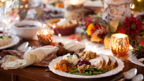 Festive Thanksgiving meal with candles