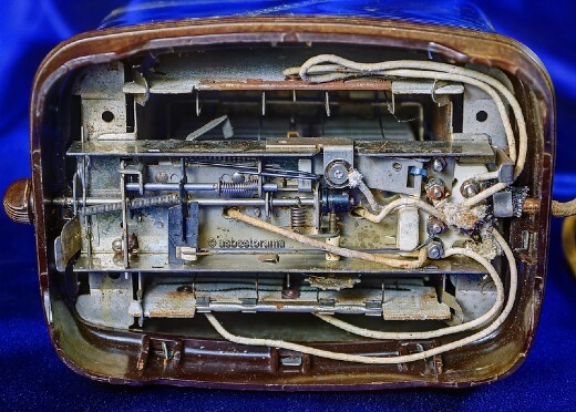 Underside of toaster with asbestos wiring
