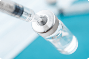 vaccine vial dose with syringe