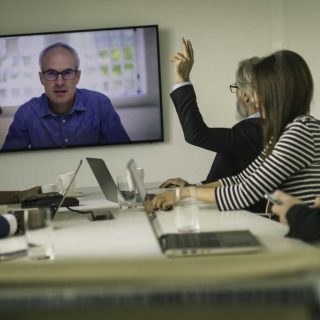 Lawyers virtually meeting with client