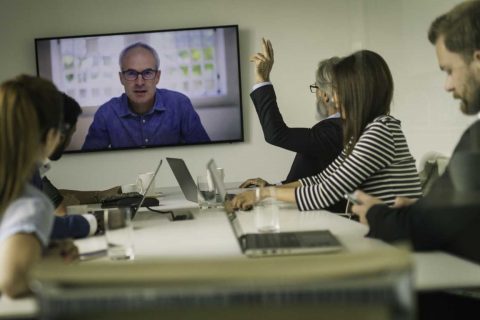 Lawyers virtually meeting with client