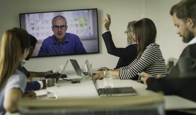 Lawyers virtually meeting with client