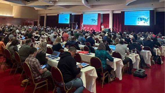 Conference attendees at tables