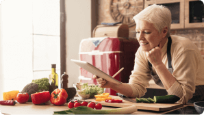 woman reviewing dietary plan and cooking healthy food