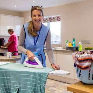 Woman ironing clothes