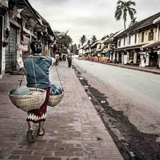 Woman walking in Laos