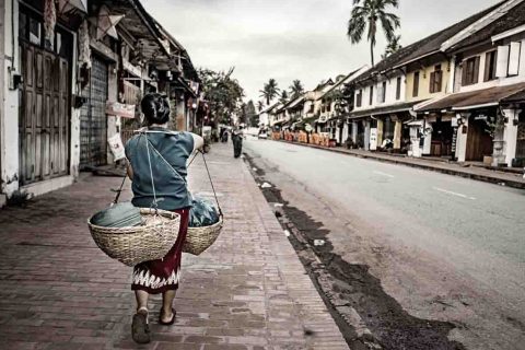 Woman walking in Laos