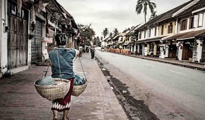 Woman walking in Laos