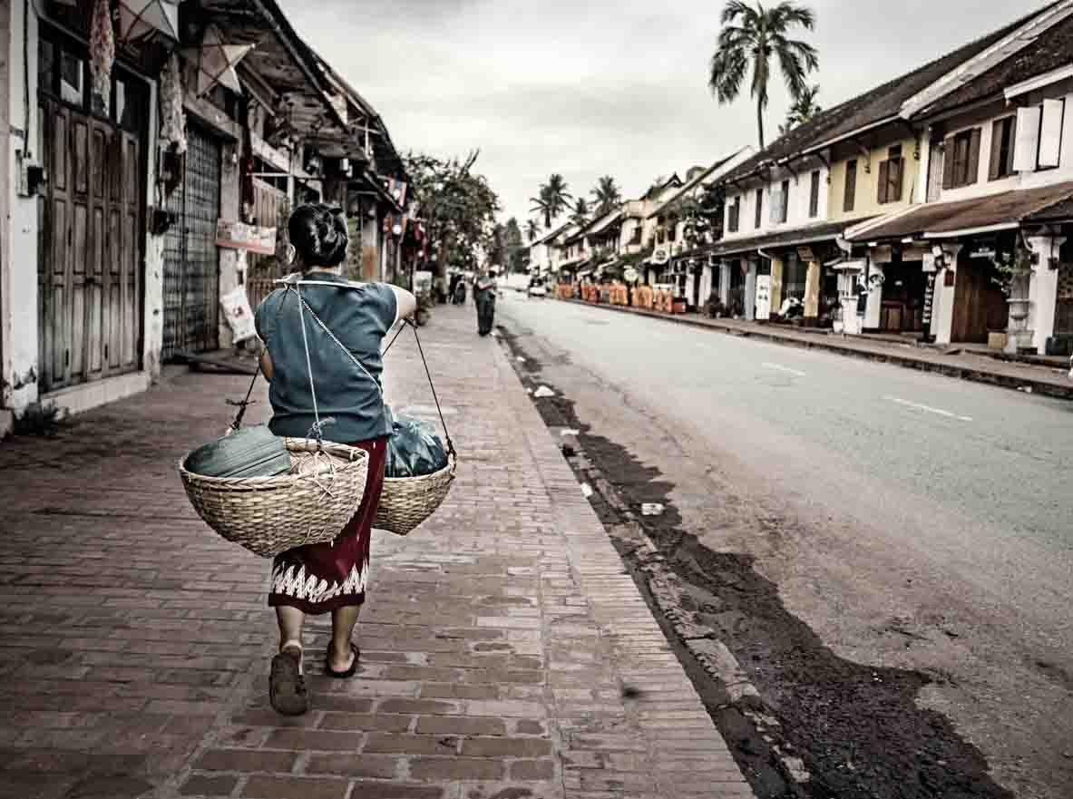 Woman walking in Laos