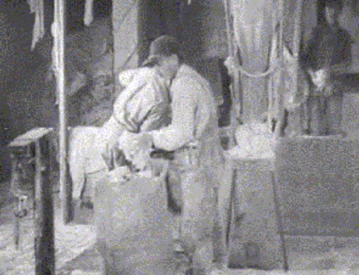 Johns-Manville worker handling asbestos