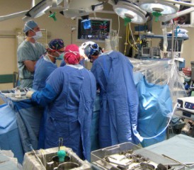 Surgeons operating on a patient Surgeons operating on a patient