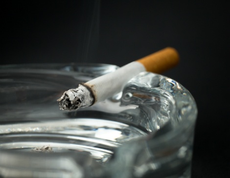 Cigarette in Ashtray Cigarette in Ashtray
