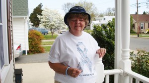 Mary Cook wearing Awareness shirt of Mesothelioma in Memory of my husband Harry Cook, sr. and Jr.