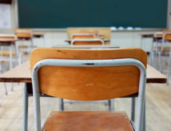 Desk and chair in a classroom