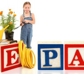 Child with large wooden blocks that spell EPA