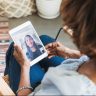 Woman and teen visiting over FaceTime on tablet