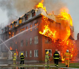 Firefighters extinguishing a building fire