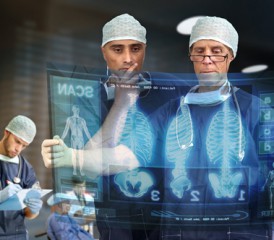Two doctors looking at X-rays Two doctors looking at X-rays