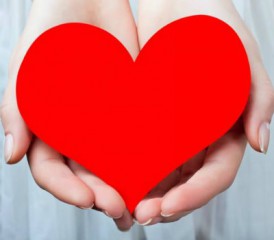Two open hands holding red heart Two open hands holding red heart