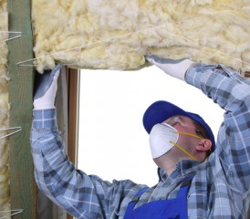 Man installing insulation Man installing insulation