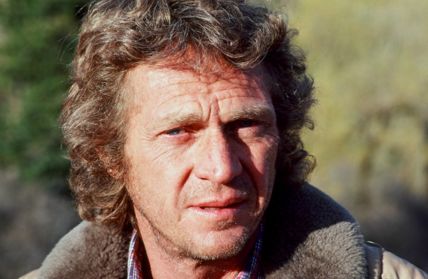 McQueen the actor Known for tough guy roles in “Bullitt” and “The Great Escape,” McQueen became the highest-paid movie star in the world in 1974.