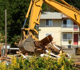 Tractor demolishing a house Tractor demolishing a house