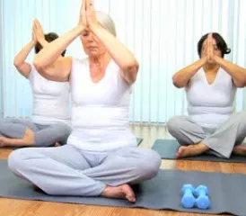 Women practicing yoga Women practicing yoga