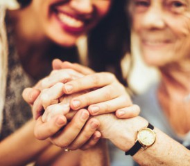Two happy women holding hands Two happy women holding hands