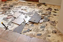 Broken floor tiles during a home remodel