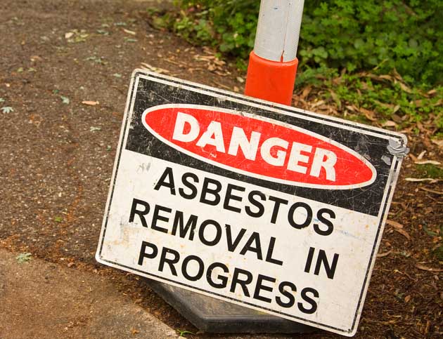 Danger sign, asbestos removal in progress Danger sign, asbestos removal in progress