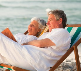 Older couple at the beach on vacation Older couple at the beach on vacation