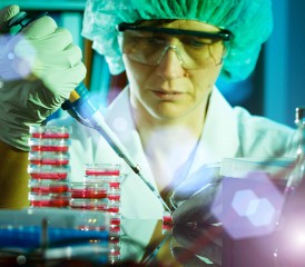 Female researcher with samples in vials Female researcher with samples in vials