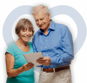 Elderly couple signing up for an online support group