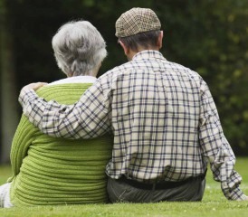 Older couple sitting in park Older couple sitting in park