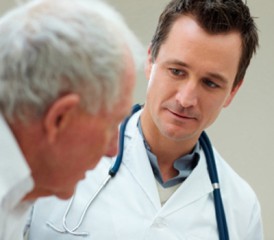 Doctor Telling His Patient Their Prognosis Doctor Telling His Patient Their Prognosis