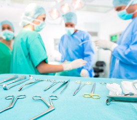 Doctors preparing for surgery Doctors preparing for surgery