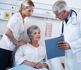 Daughter visiting doctor with her mother
