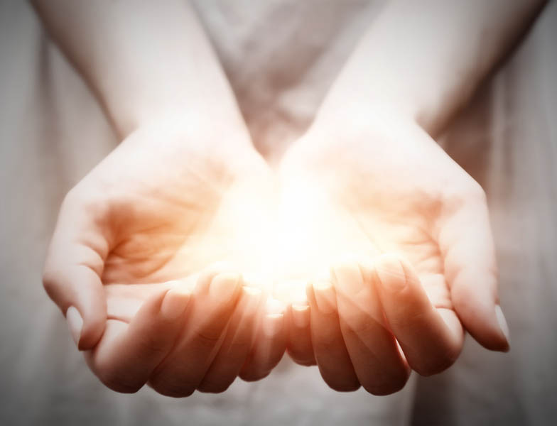 Hands holding light Hands holding light
