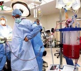 Surgeons in an operating room Surgeons in an operating room