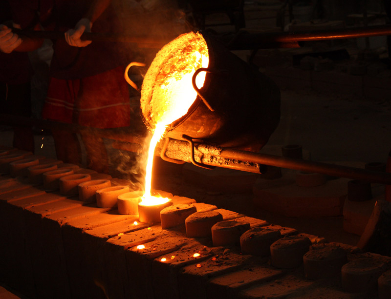 Iron ore casted into a mold Iron ore casted into a mold