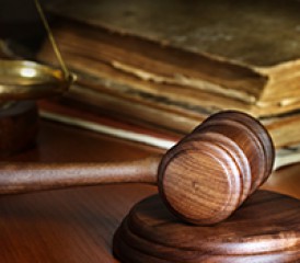 Gavel on wooden desk Gavel on wooden desk