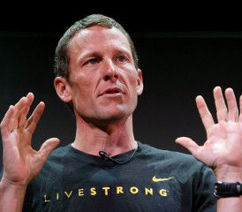 Lance Armstrong wearing a Livestrong shirt Lance Armstrong wearing a Livestrong shirt