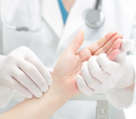 Doctor holding patient's hand Doctor holding patient's hand