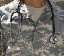 Military doctor in fatigues and stethoscope Military doctor in fatigues and stethoscope