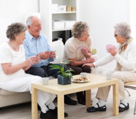 Nursing home residents playing cards Nursing home residents playing cards
