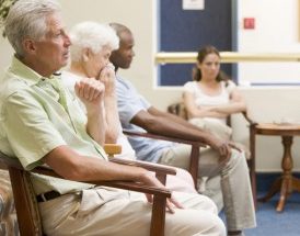Patients in a waiting room Patients in a waiting room